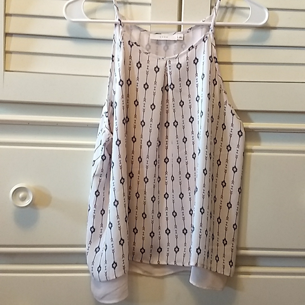 Lush cream colored tank. Flowy fit, high neck, has lining for extra coverage.